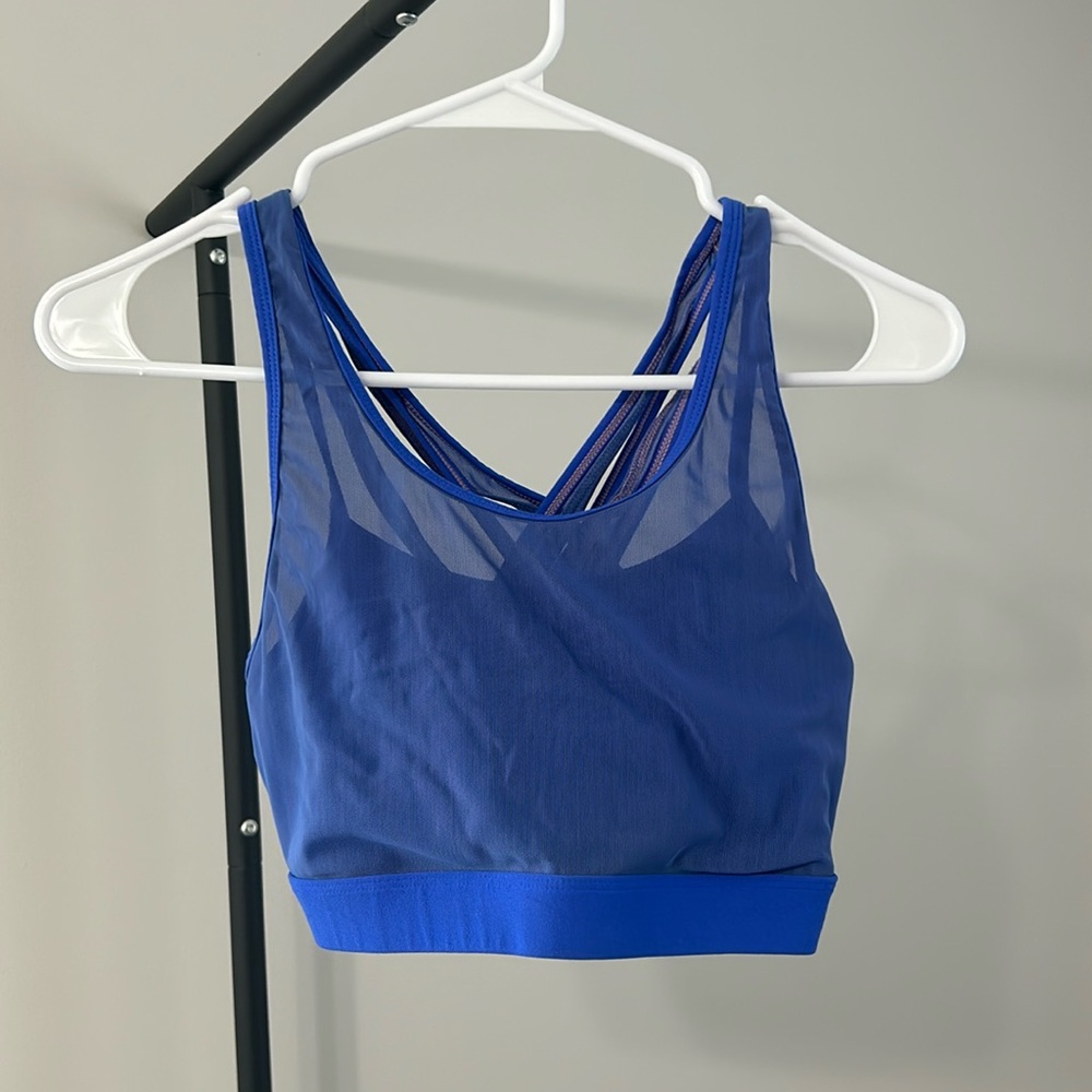 Fabletics strappy blue sports bra. Size S